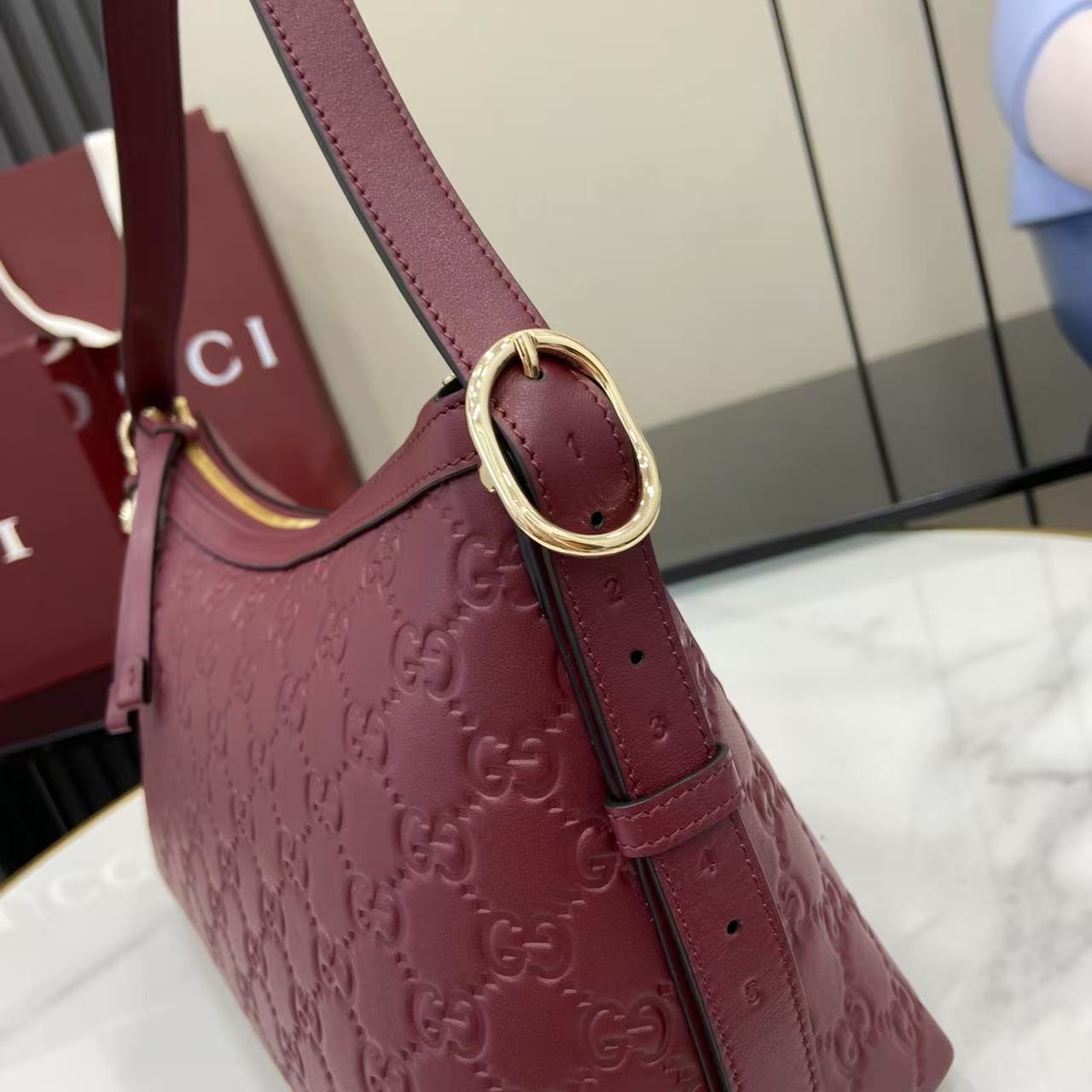 GG Emblem Leather Shoulder Bag