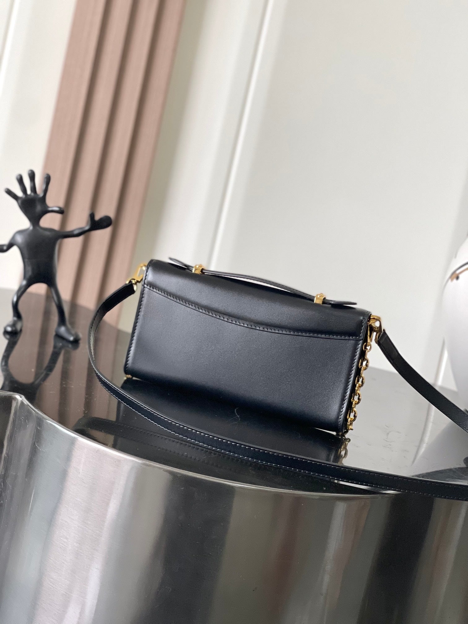 Capucines Wallet On Chain in Black Leather with Gold Chain