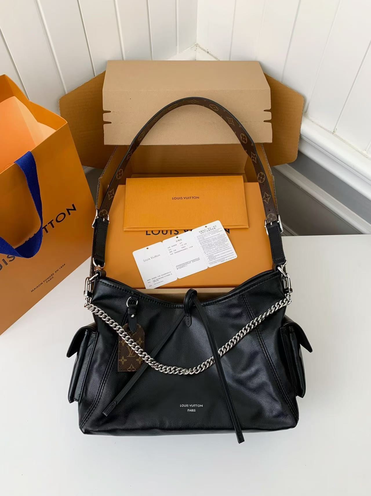 Black Leather Carryall Handbag with Chain Detail