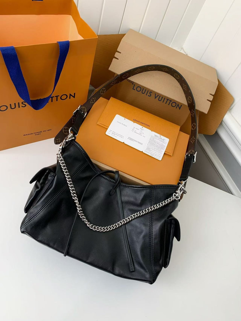 Black Leather Carryall Handbag with Chain Detail