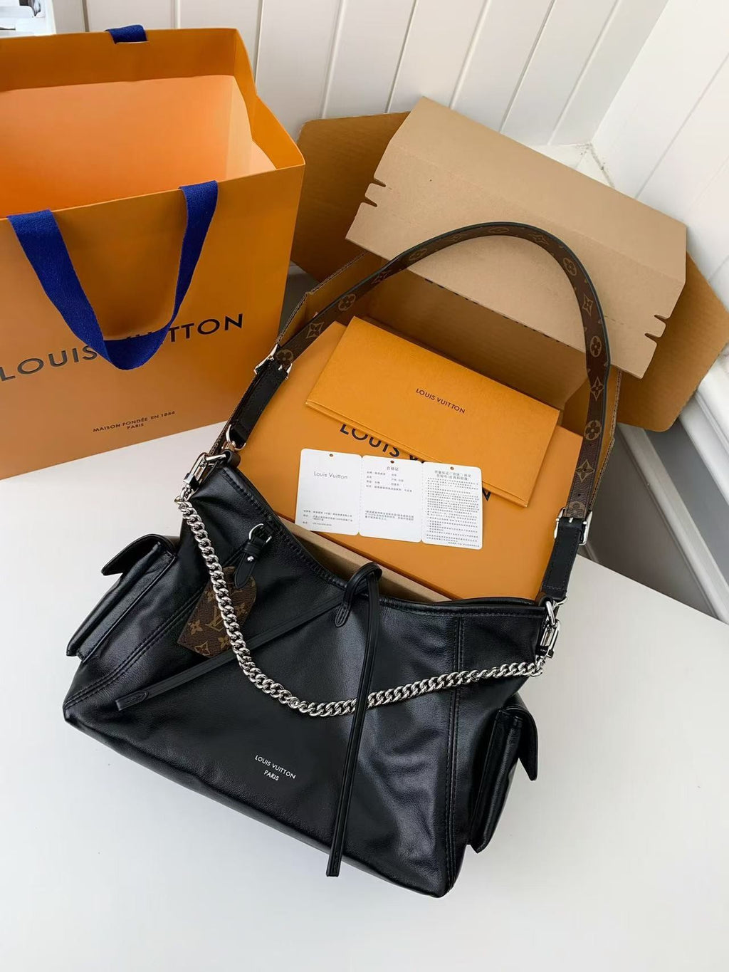 Black Leather Carryall Handbag with Chain Detail