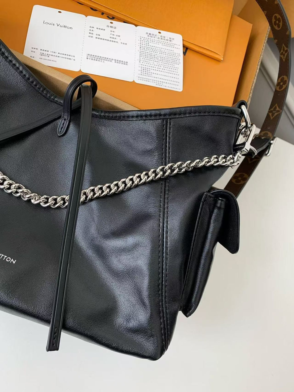 Black Leather Carryall Handbag with Chain Detail
