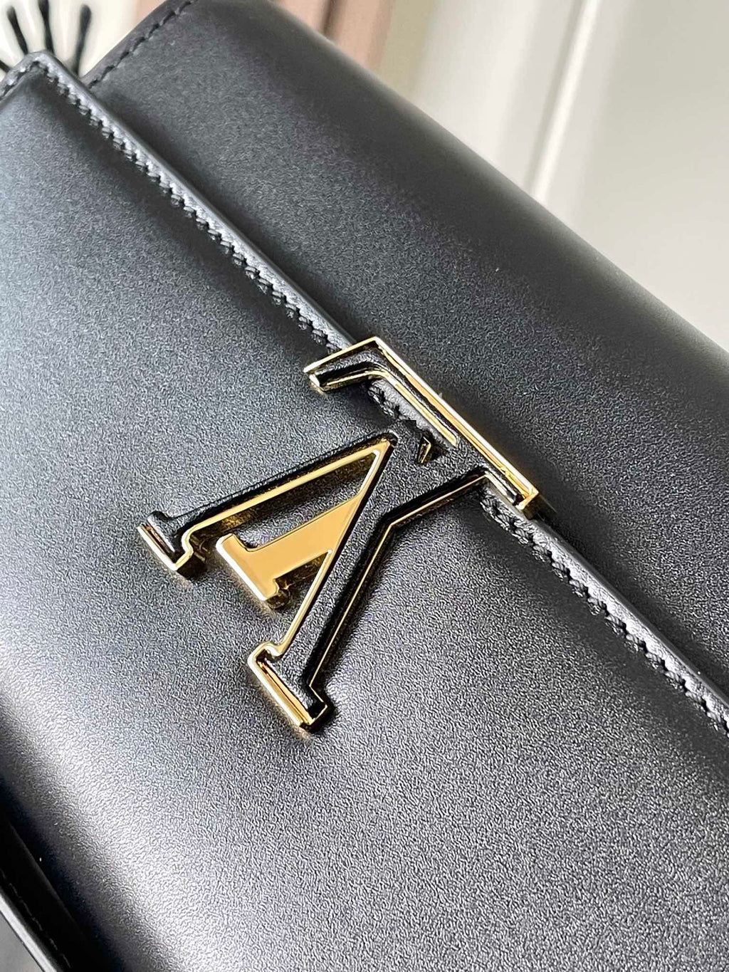 Capucines Wallet On Chain in Black Leather with Gold Chain