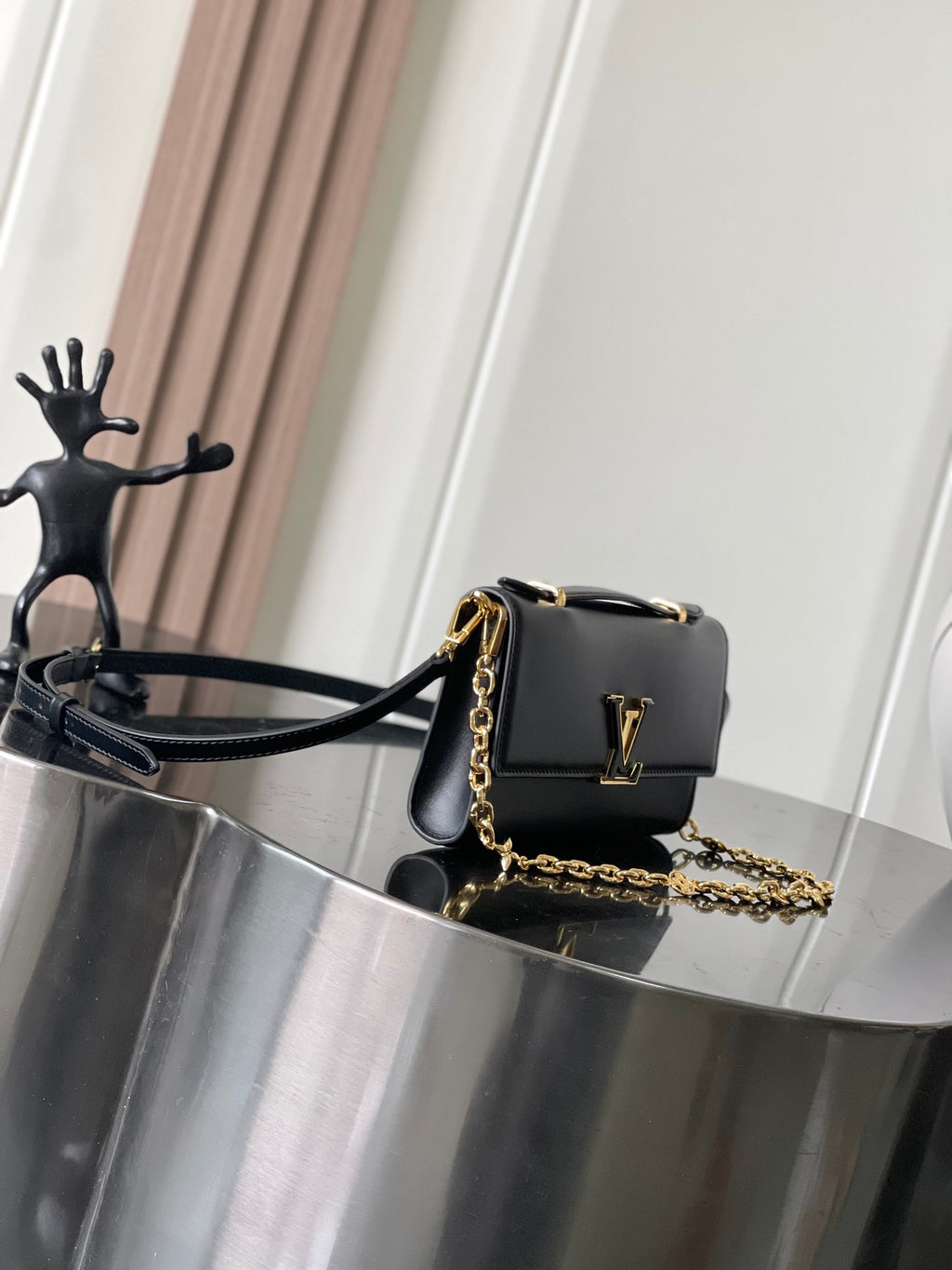 Capucines Wallet On Chain in Black Leather with Gold Chain