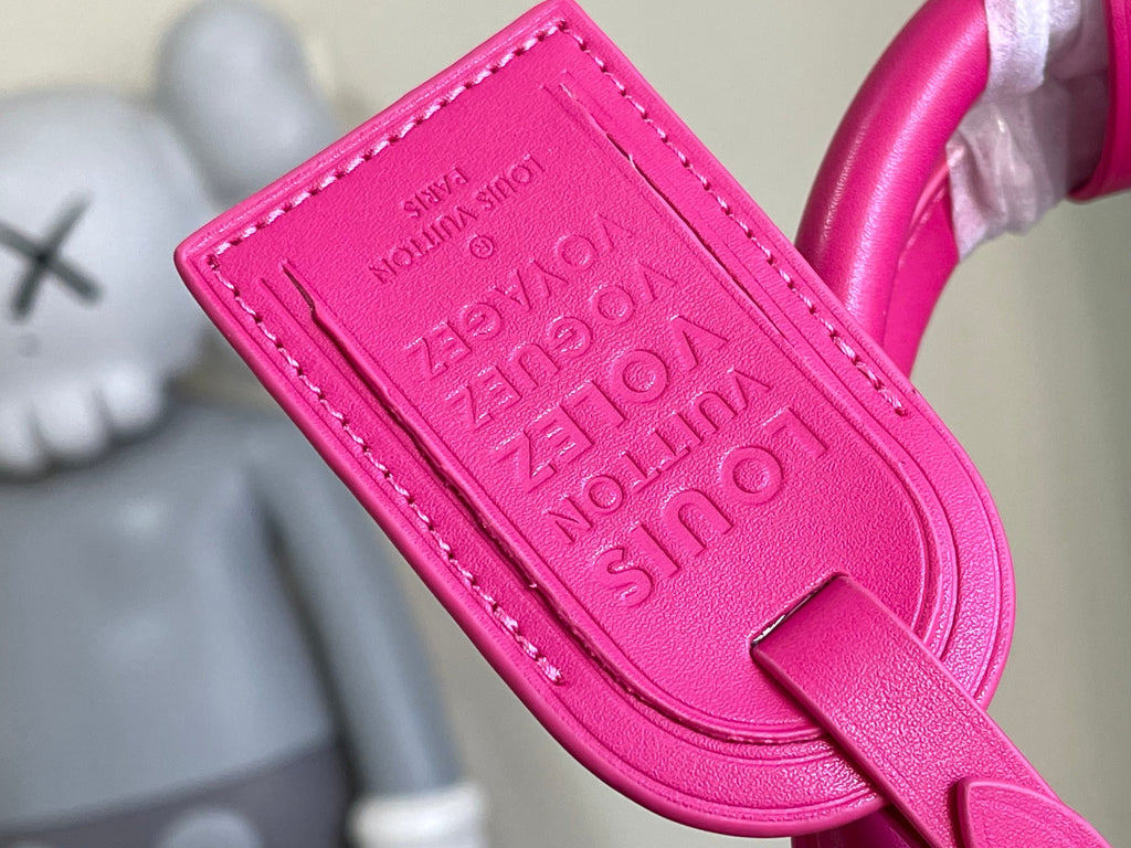 Keepall Bandoulière 50 – Monogram Canvas with Pink Leather Trim