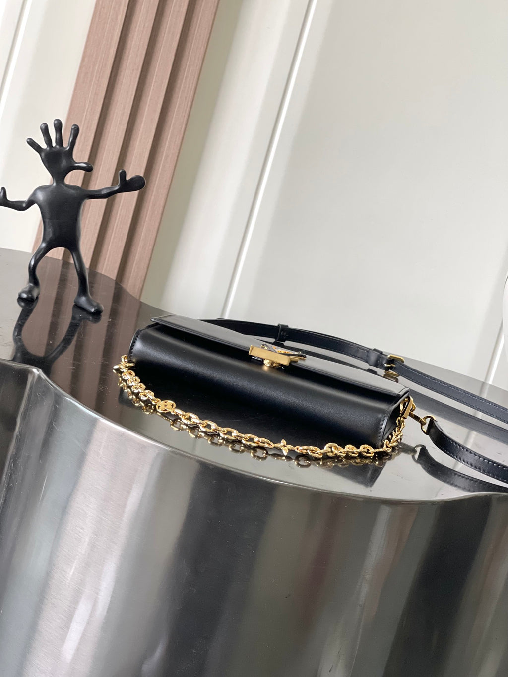 Capucines Wallet On Chain in Black Leather with Gold Chain