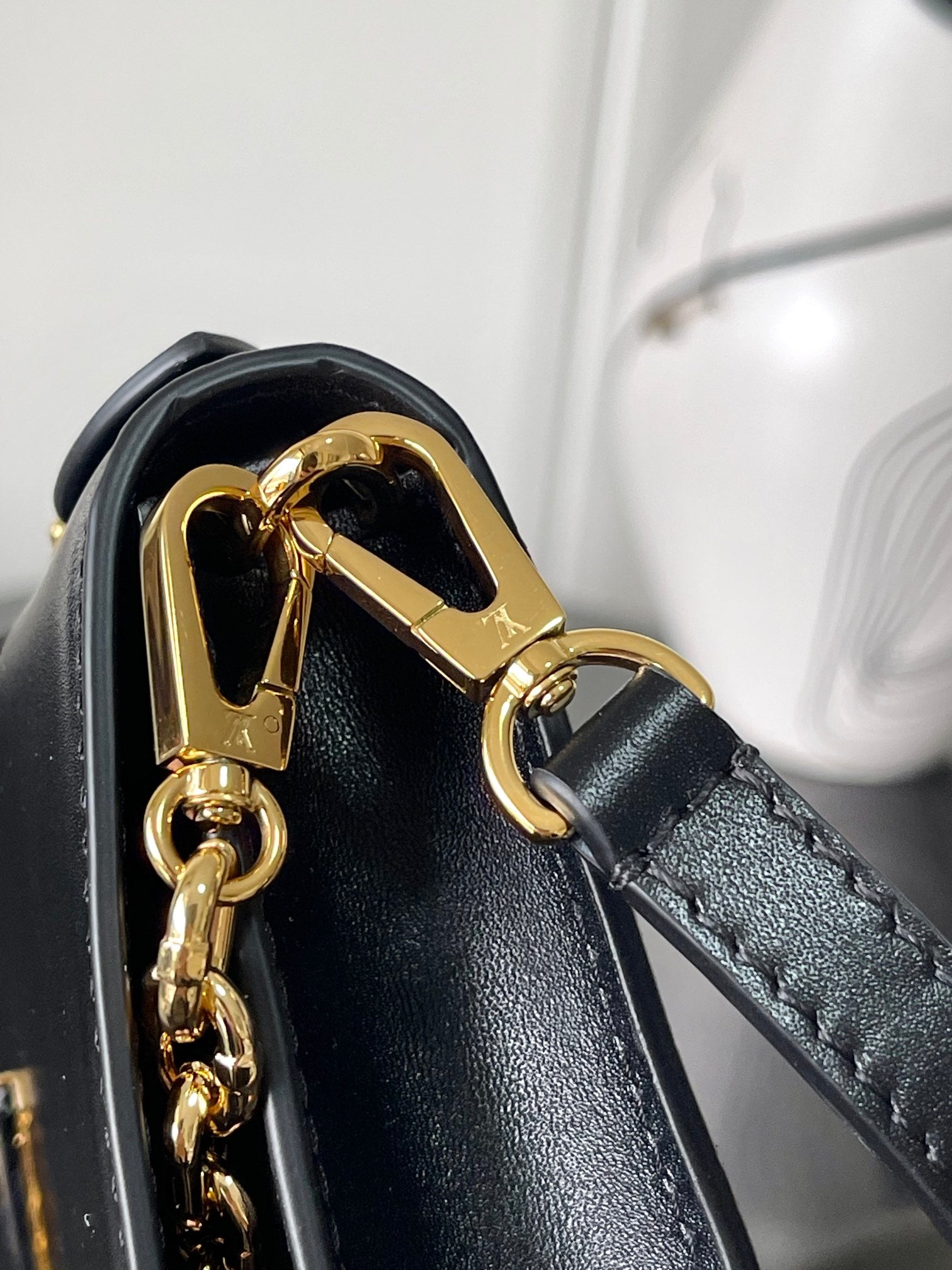 Capucines Wallet On Chain in Black Leather with Gold Chain