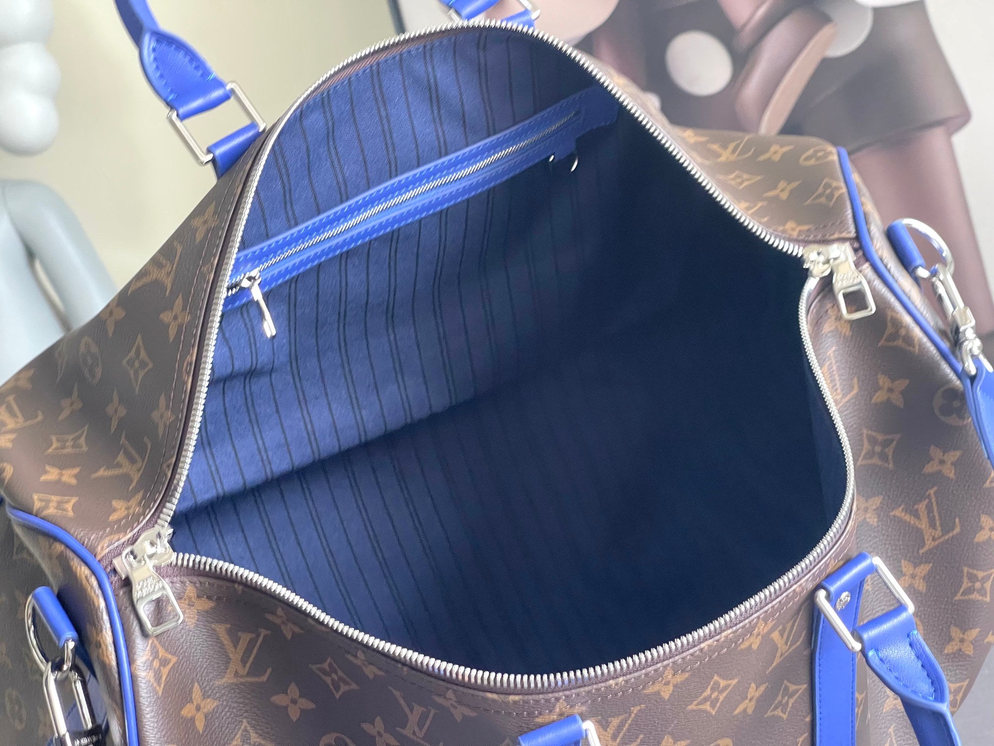 Keepall Bandoulière 50 – Monogram Canvas with Blue Leather Trim