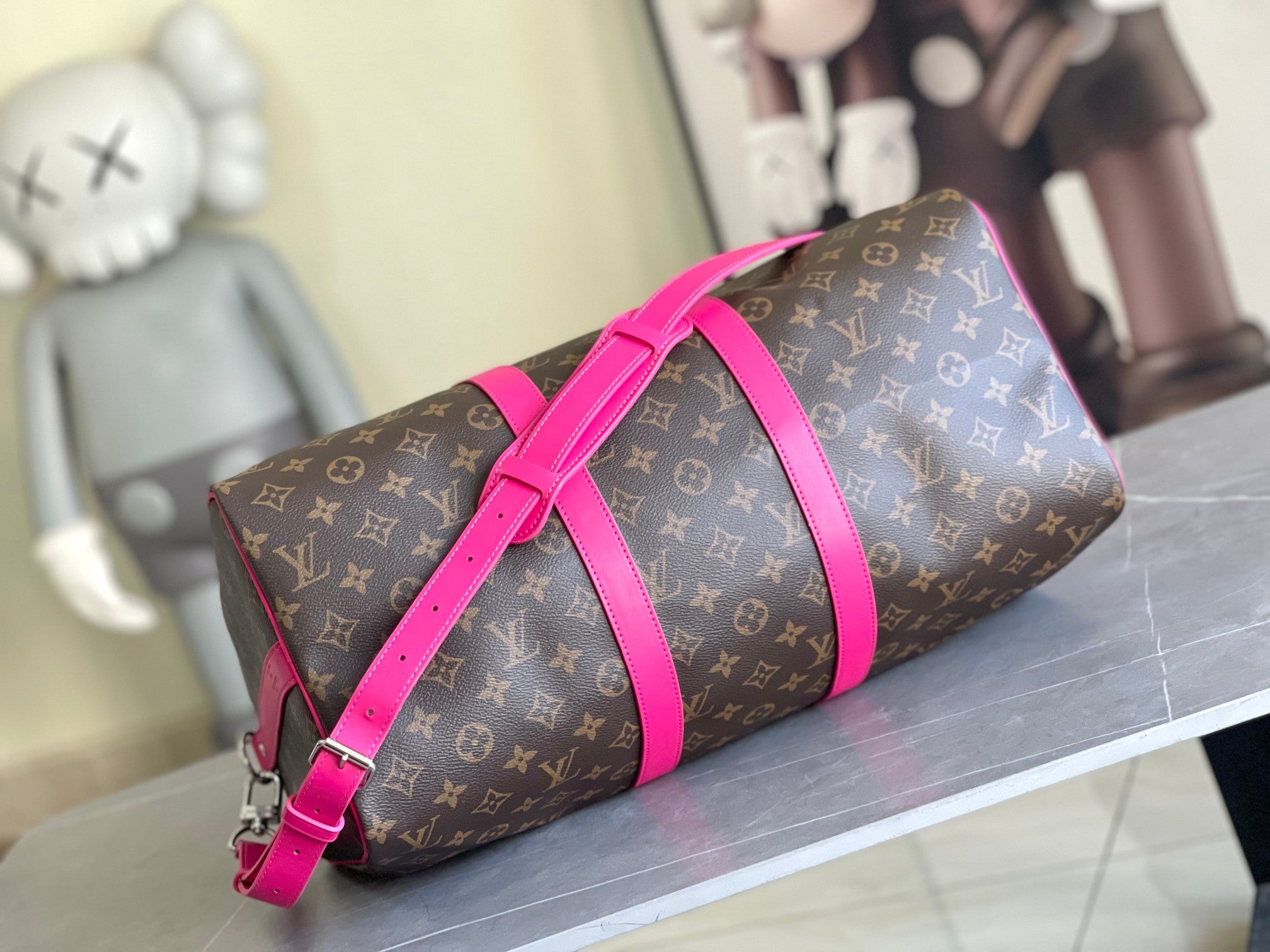 Keepall Bandoulière 50 – Monogram Canvas with Pink Leather Trim