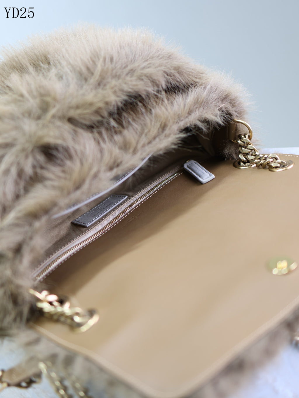 Niki Small in Shearling Bag
