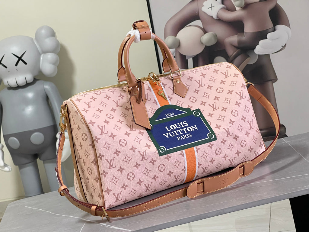 Keepall Bandoulière 50 – Pink Monogram Canvas with Vintage Logo Patch