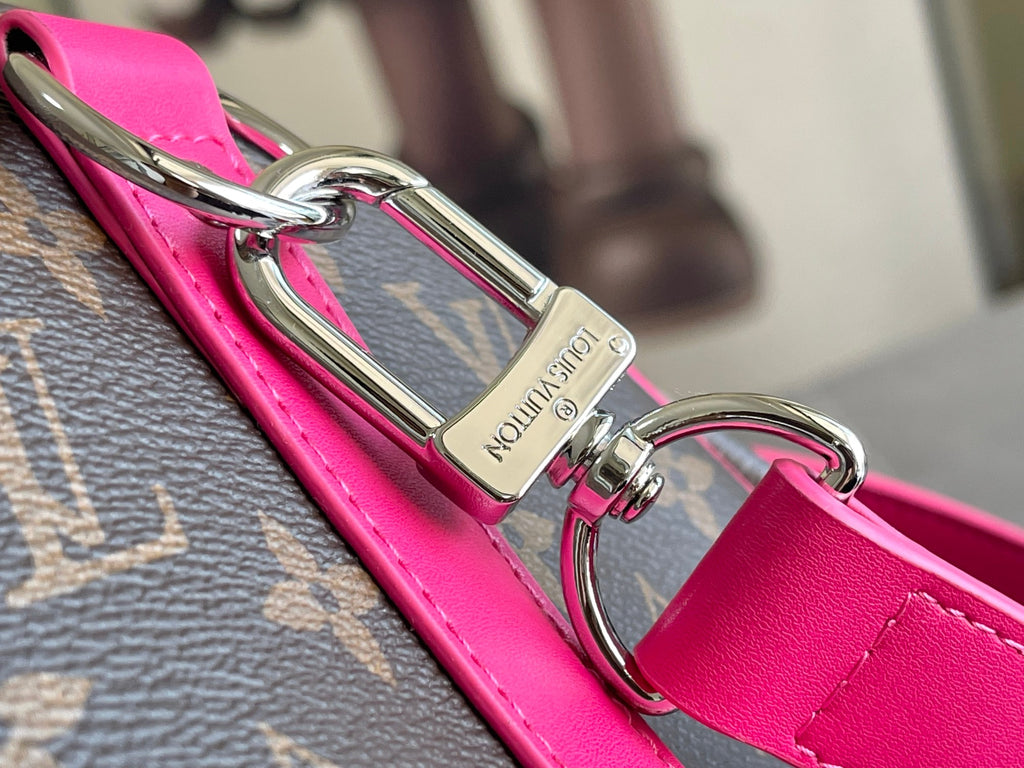 Keepall Bandoulière 50 – Monogram Canvas with Pink Leather Trim