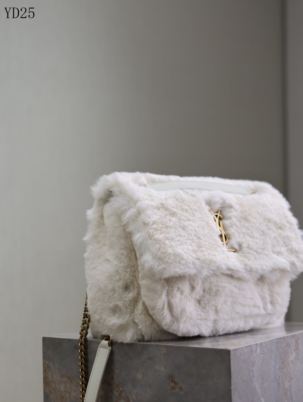 Niki Small in Shearling Bag