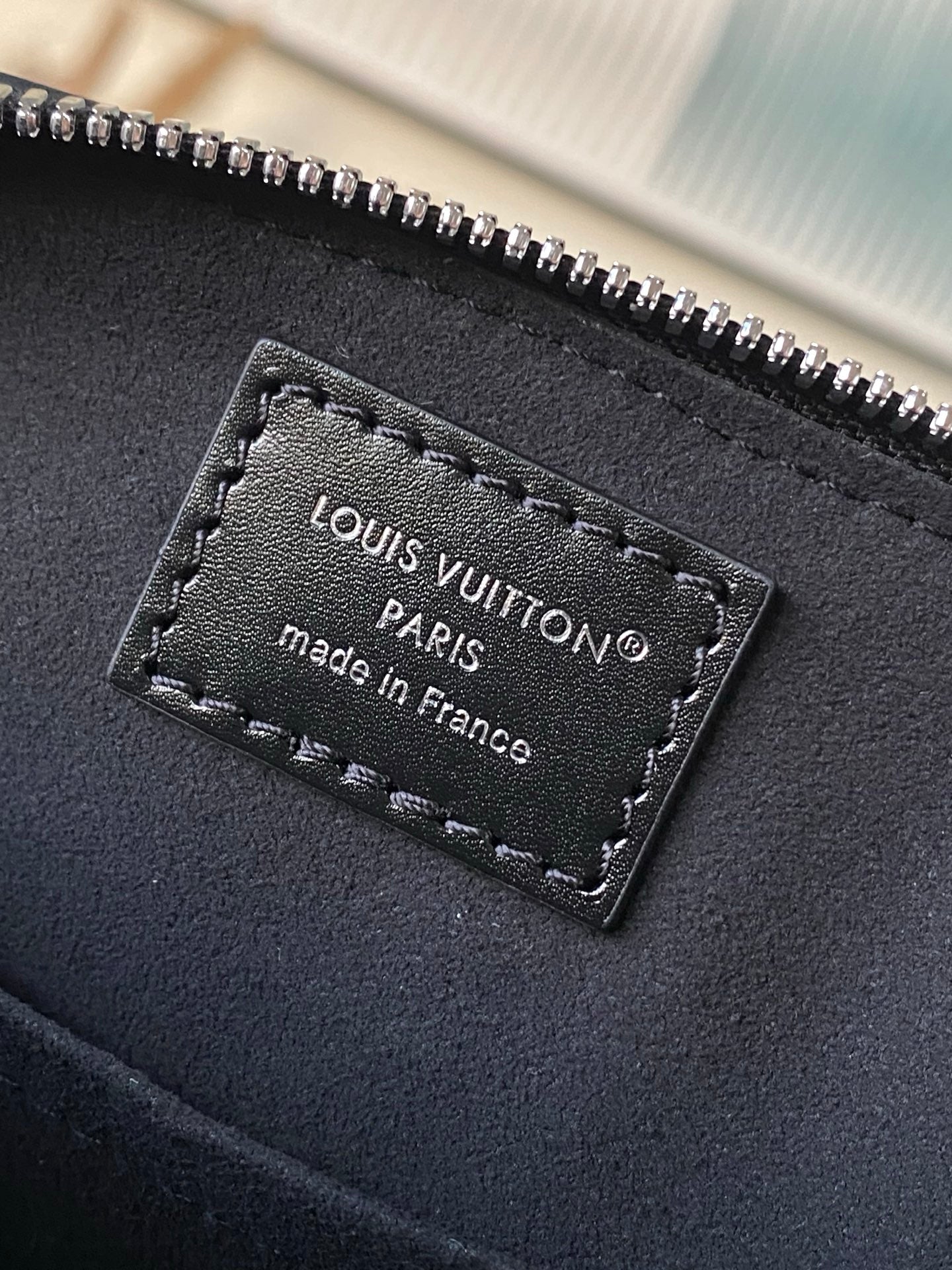 Alma BB Monogram Embossed Leather Handbag