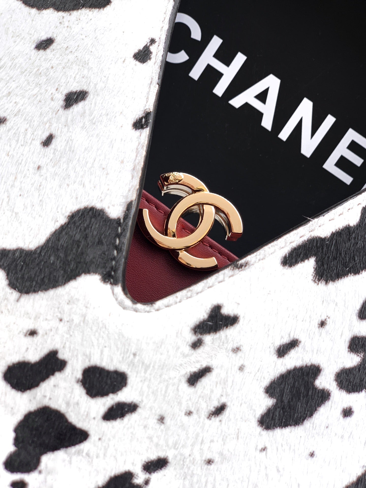 Pony Hair Quilted Triangle Top Handle Bag