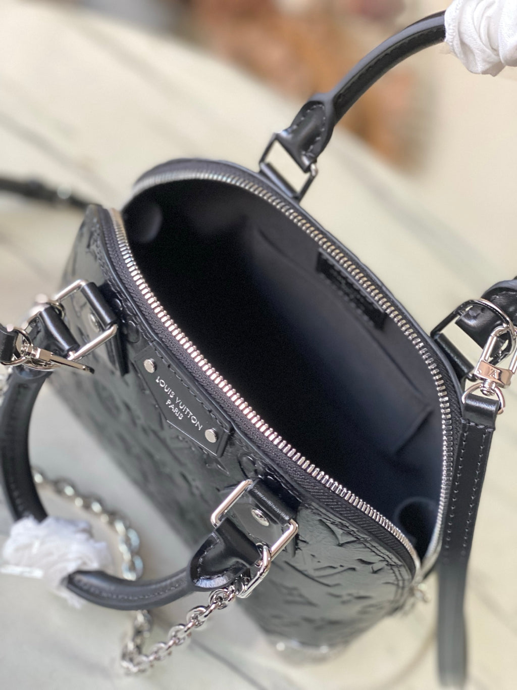 Alma BB Monogram Embossed Leather Handbag