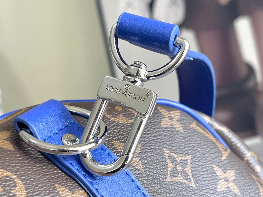 Keepall Bandoulière 50 – Monogram Canvas with Blue Leather Trim