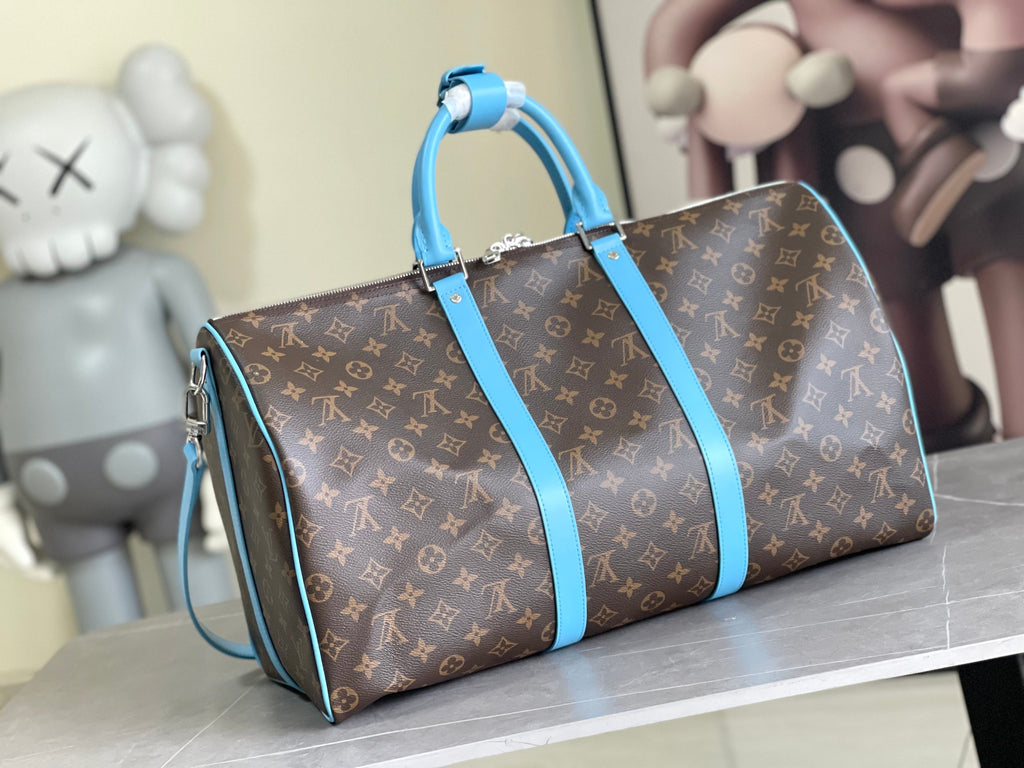 Keepall Bandoulière 50 – Monogram Canvas with Sky Blue Leather Trim