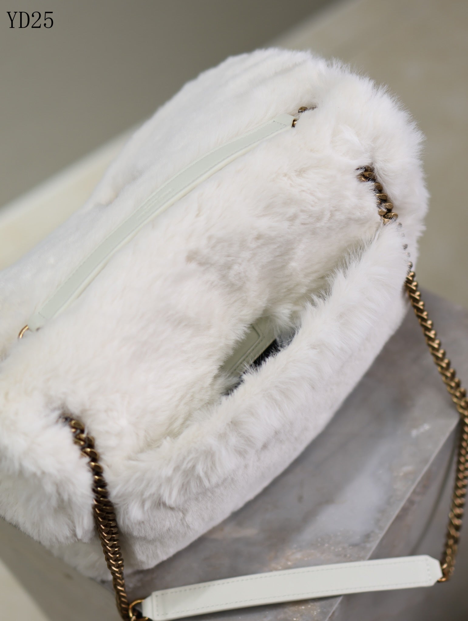 Niki Small in Shearling Bag