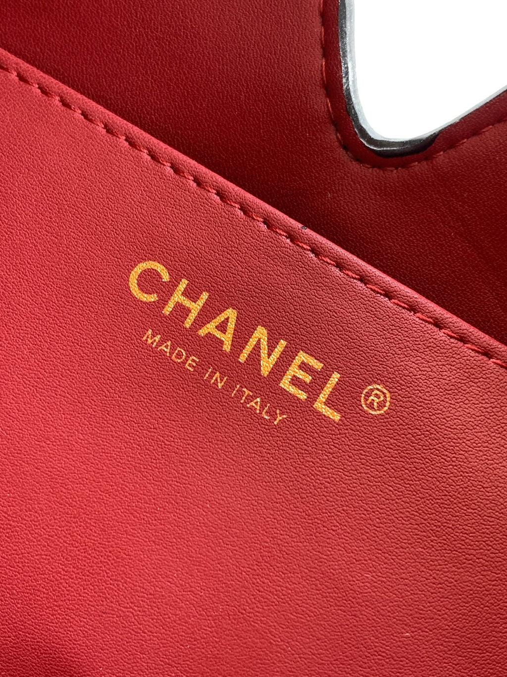 Quilted Leather Triangle Top Handle Bag