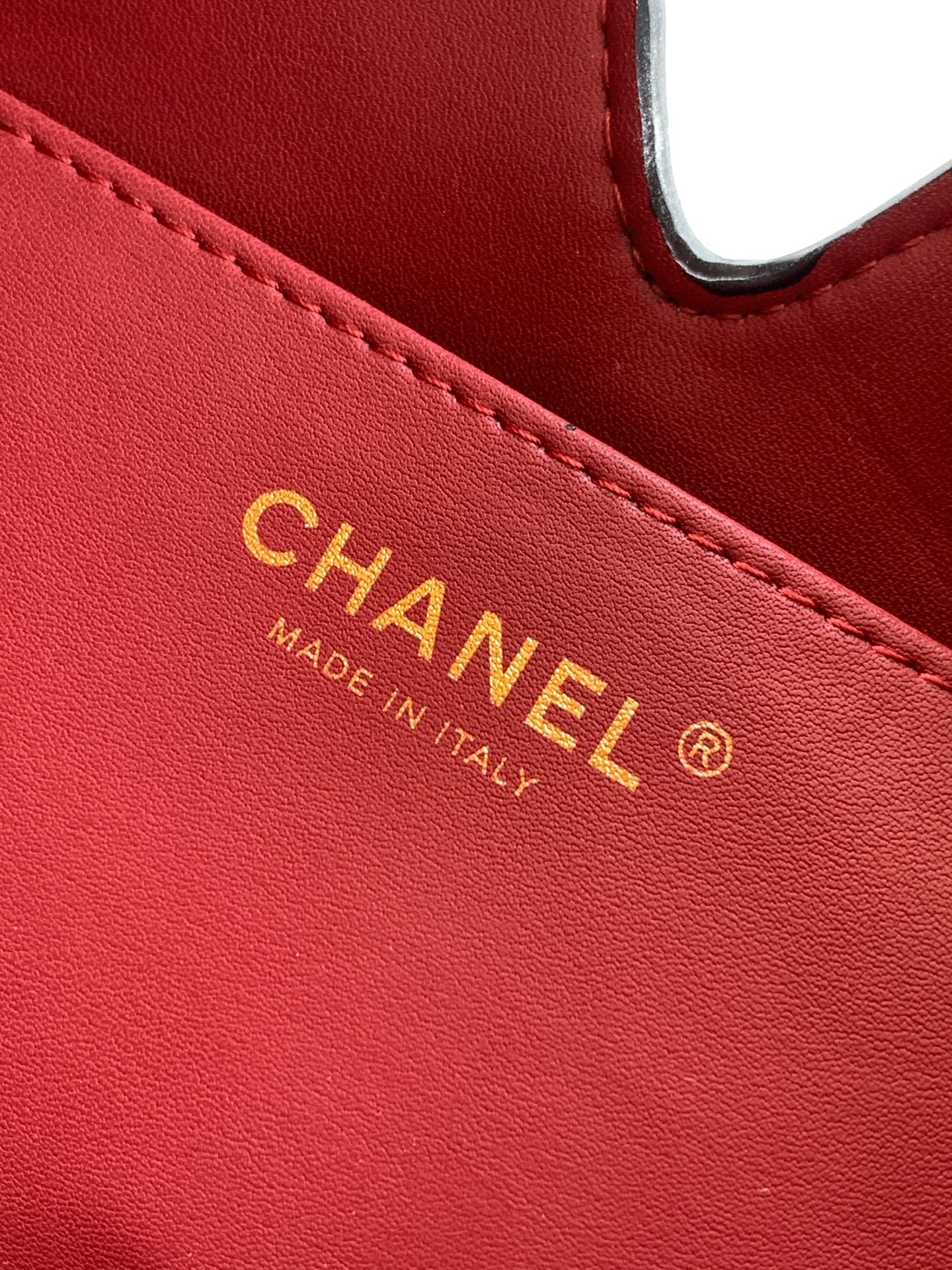 Quilted Leather Triangle Top Handle Bag