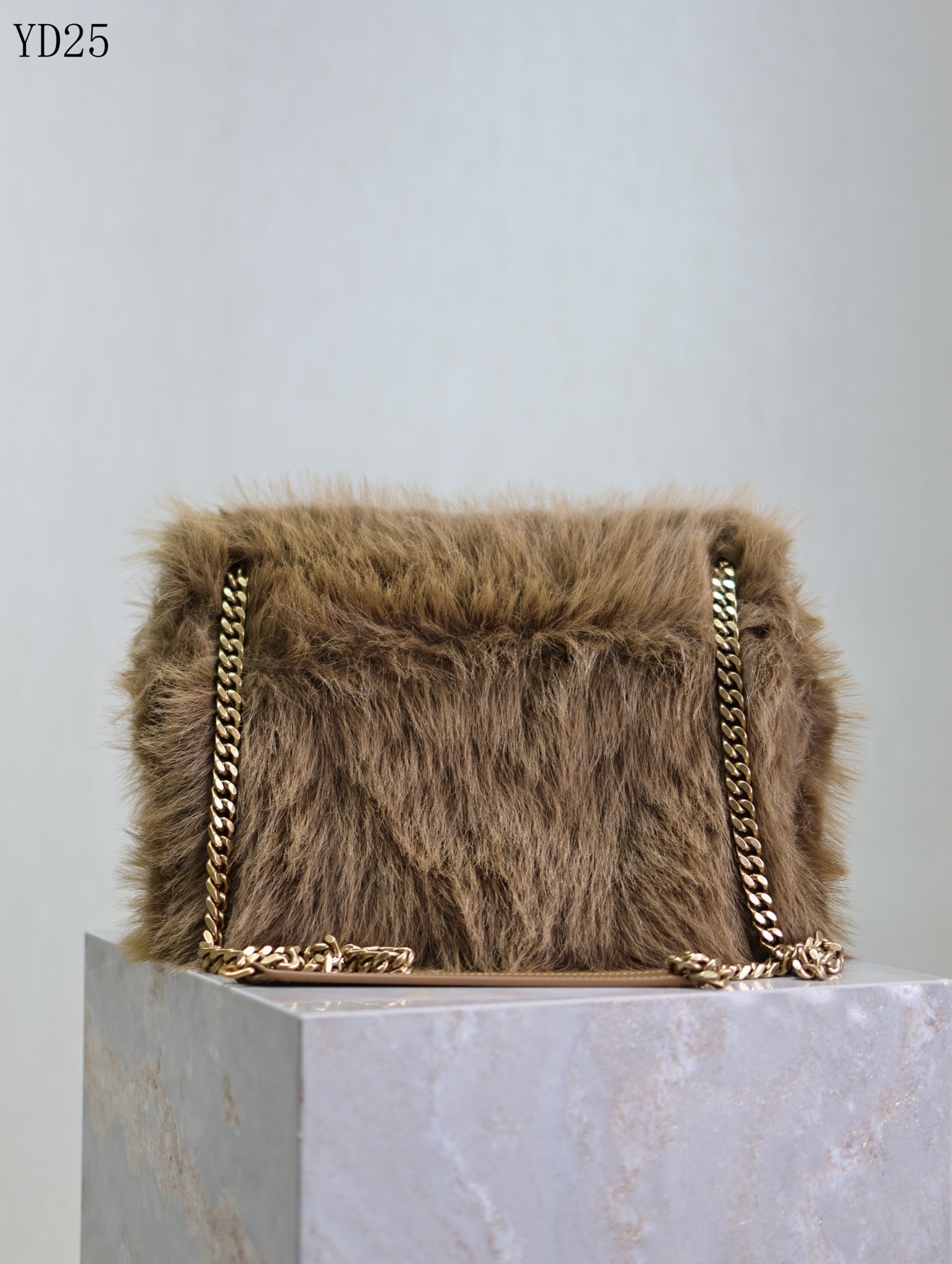 Niki Small in Shearling Bag