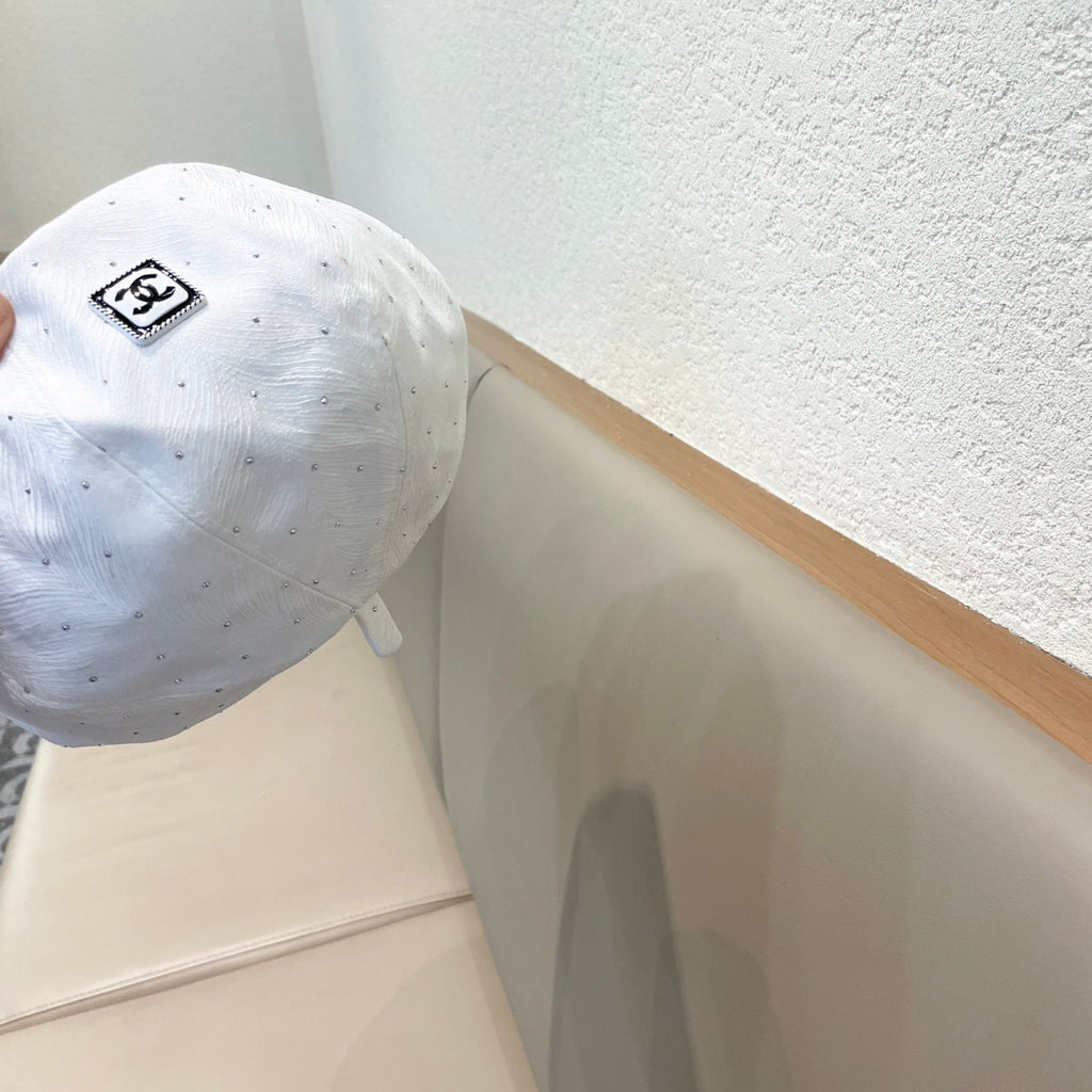 Embellished Tweed Baker Boy Cap with Iconic Logo Patch