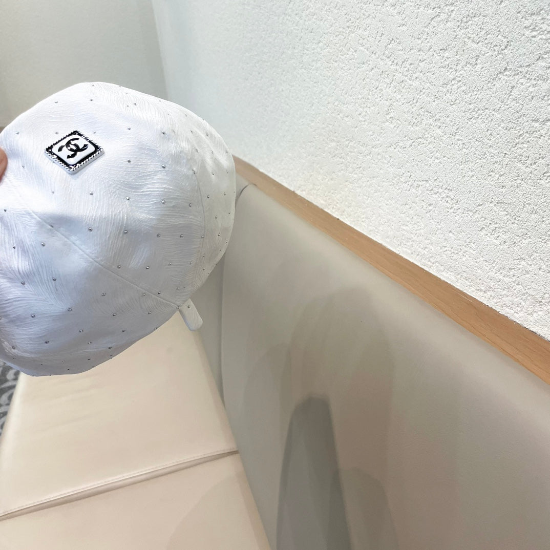 Embellished Tweed Baker Boy Cap with Iconic Logo Patch