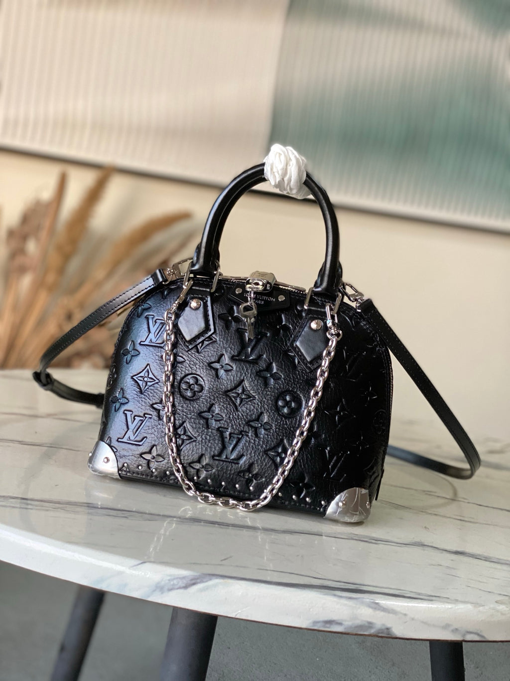 Alma BB Monogram Embossed Leather Handbag