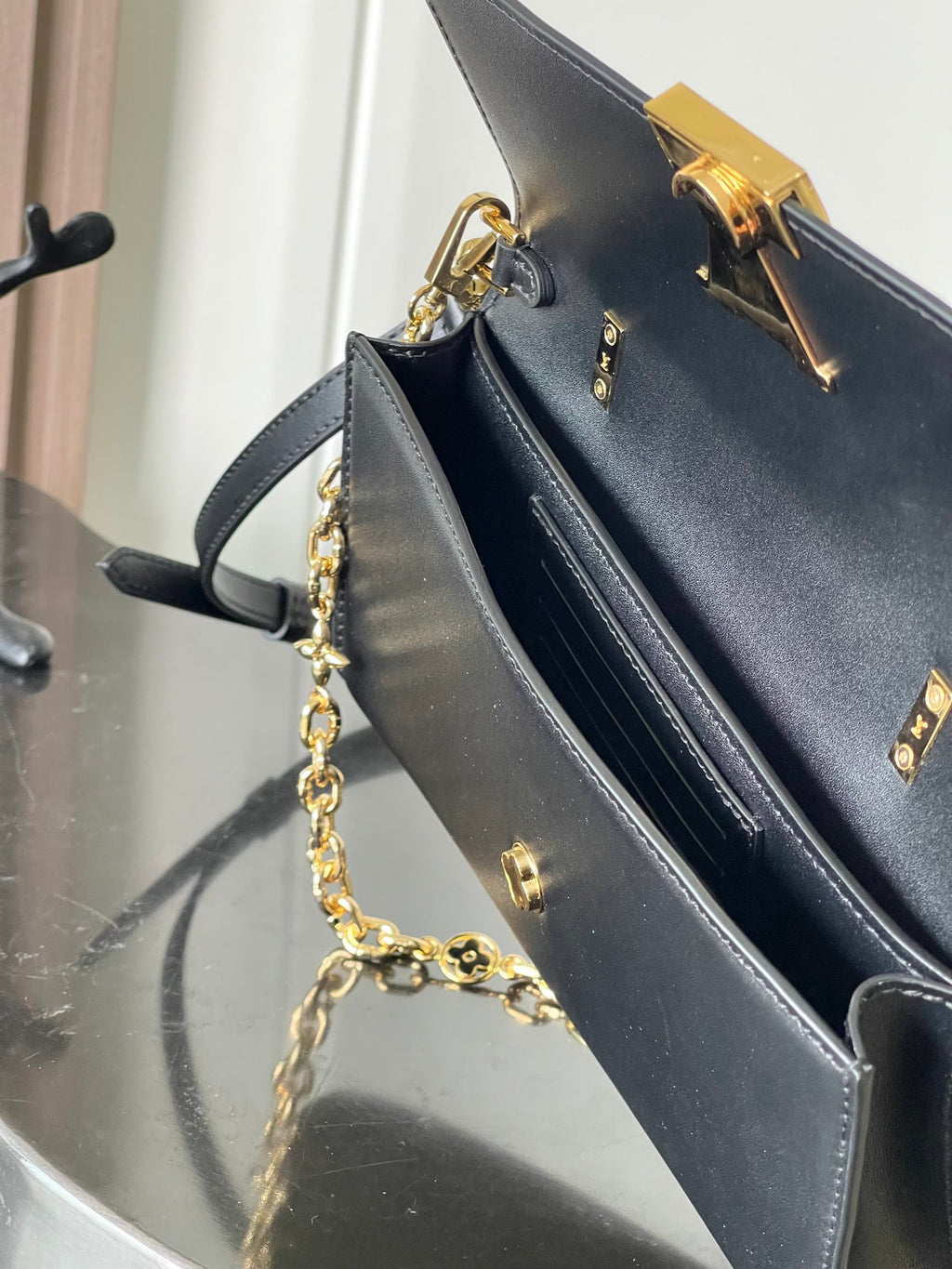 Capucines Wallet On Chain in Black Leather with Gold Chain