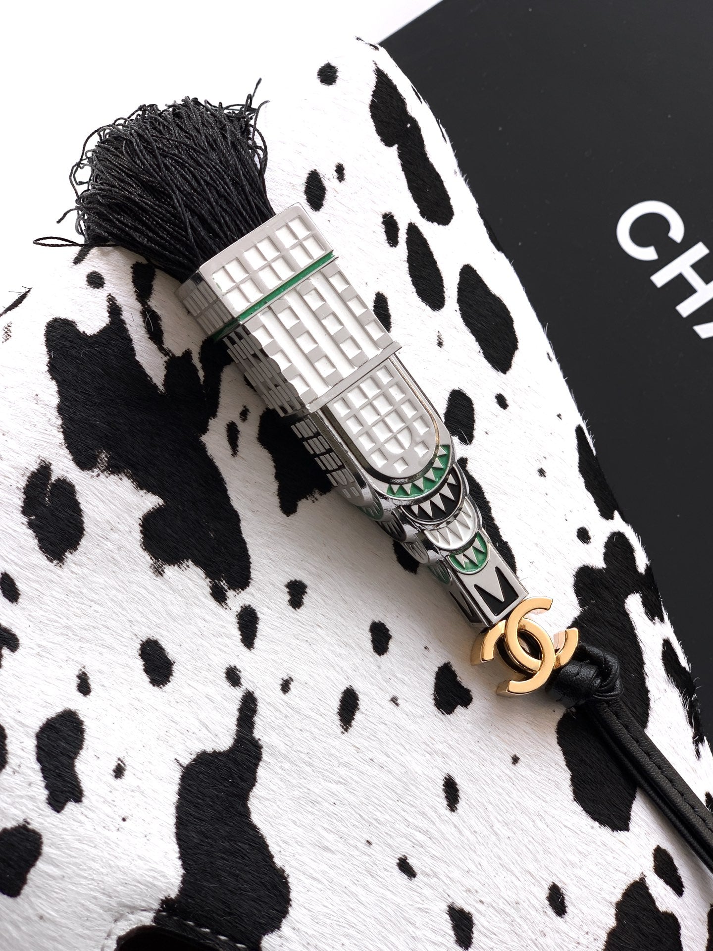 Pony Hair Quilted Triangle Top Handle Bag