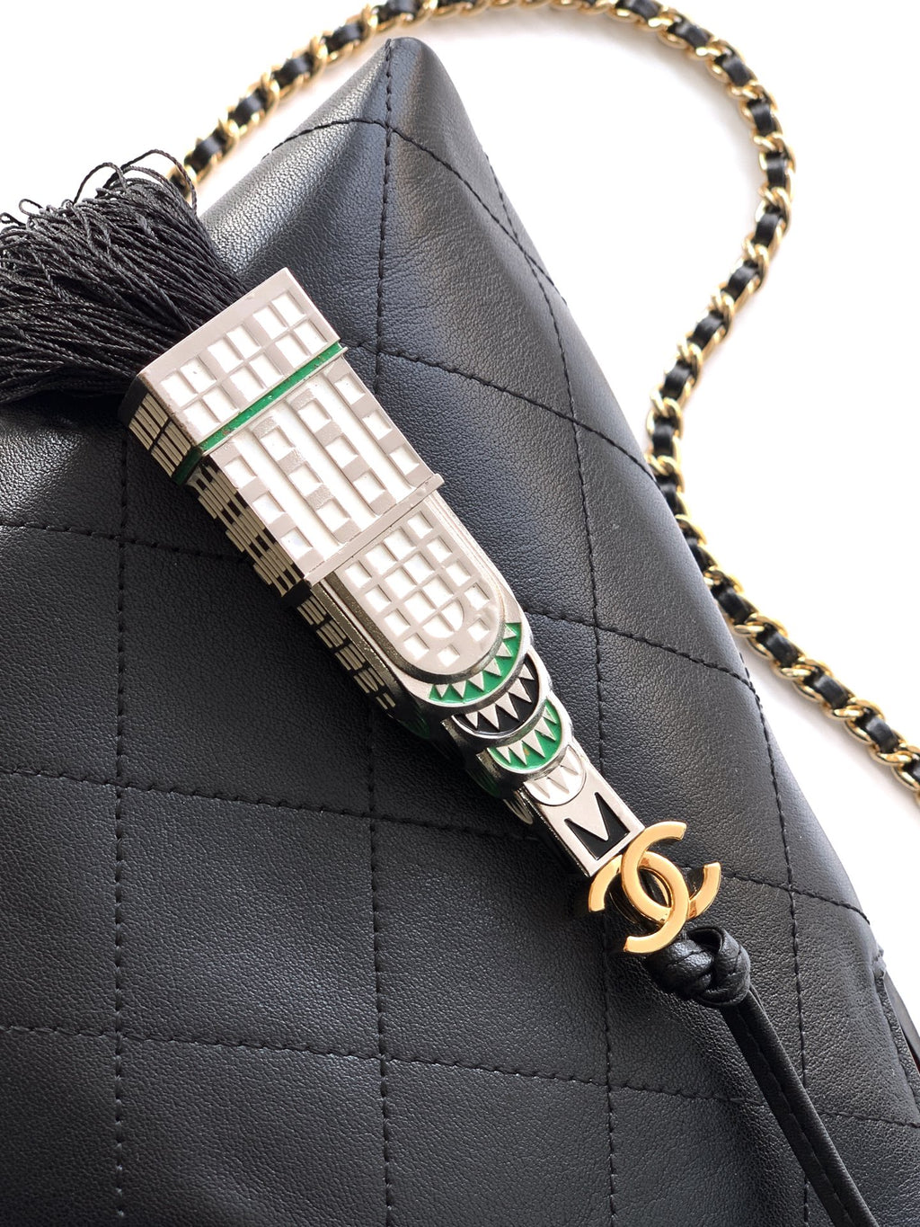 Quilted Leather Triangle Top Handle Bag