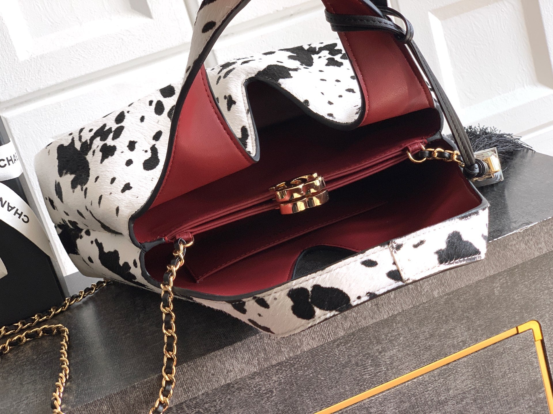 Pony Hair Quilted Triangle Top Handle Bag