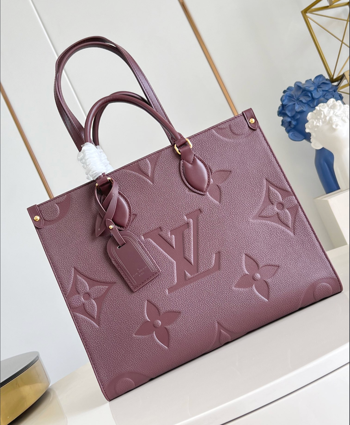 OnTheGo MM Monogram Empreinte Leather Tote
