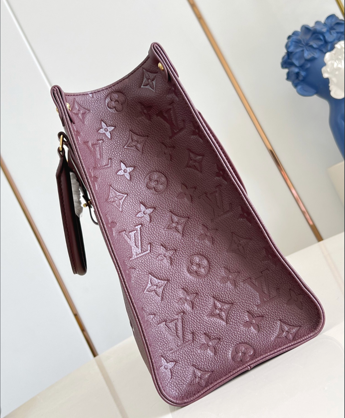 OnTheGo MM Monogram Empreinte Leather Tote