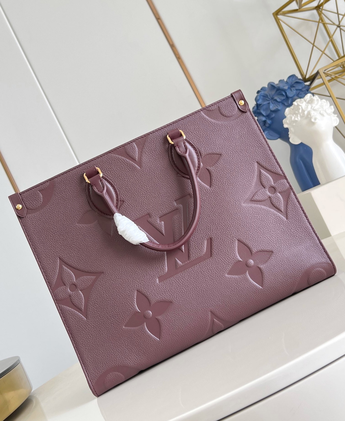 OnTheGo MM Monogram Empreinte Leather Tote