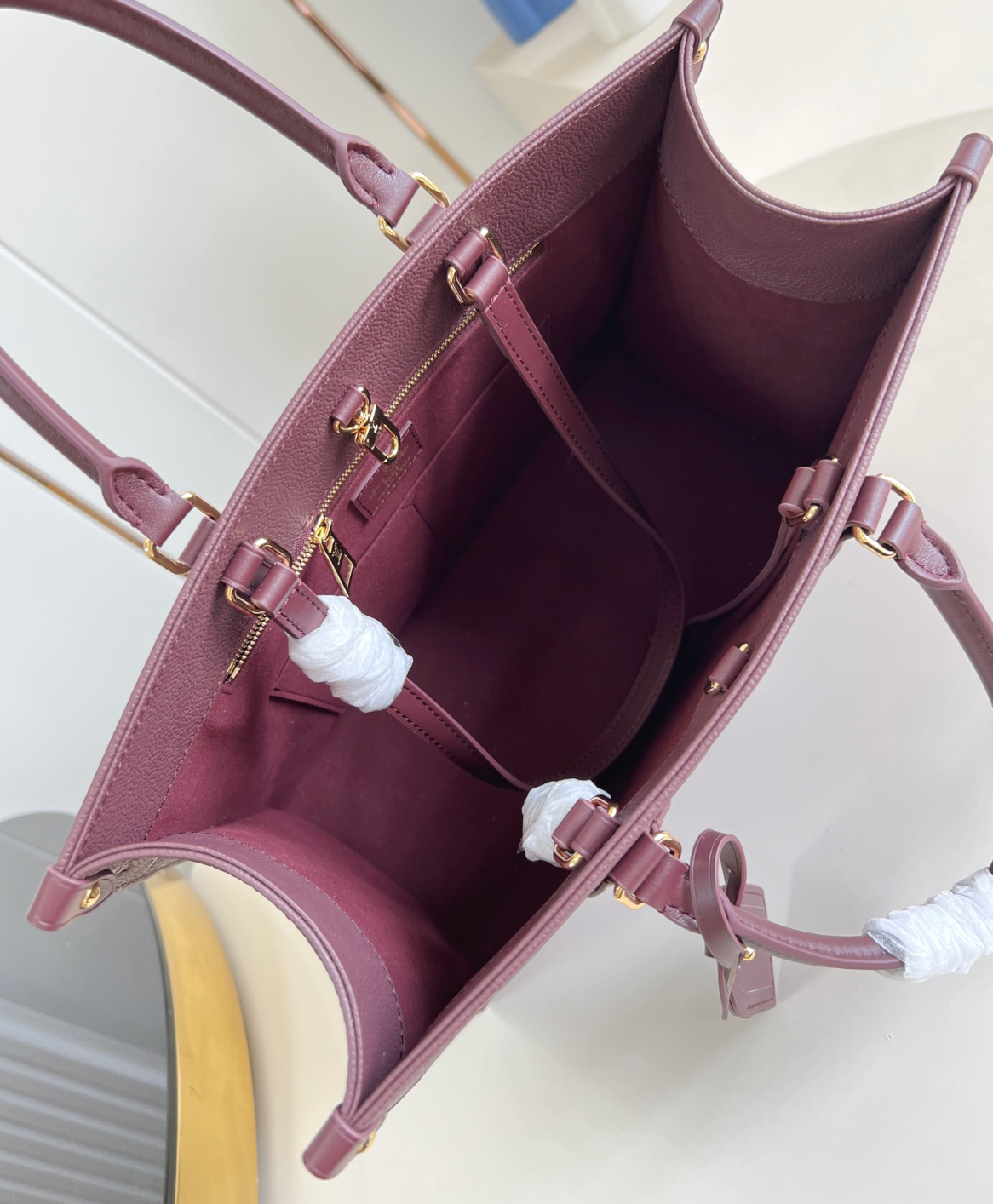 OnTheGo MM Monogram Empreinte Leather Tote