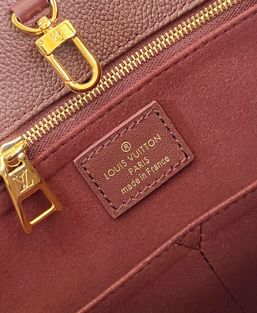 OnTheGo MM Monogram Empreinte Leather Tote