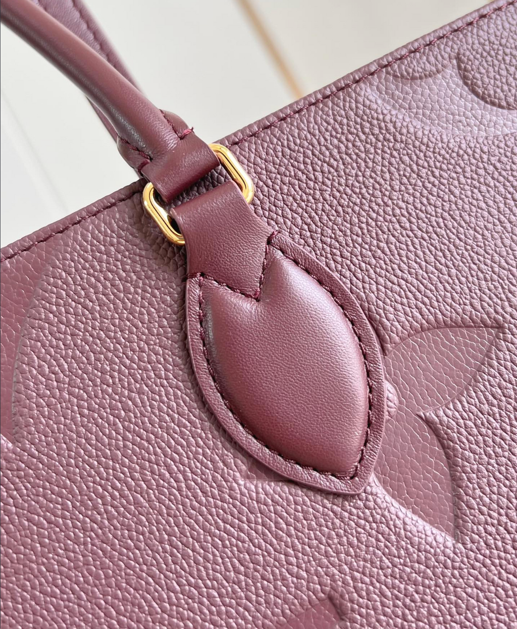 OnTheGo MM Monogram Empreinte Leather Tote