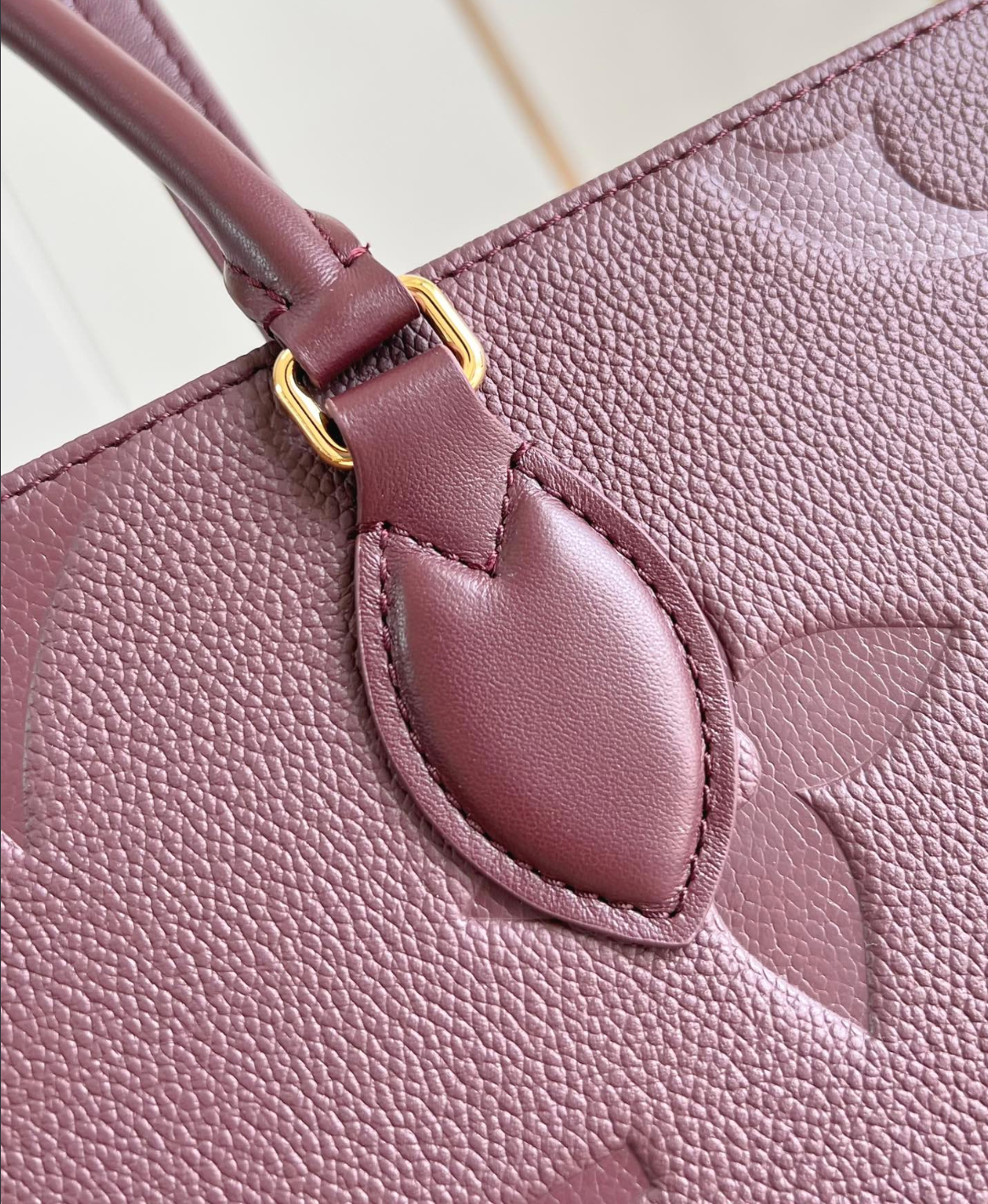 OnTheGo MM Monogram Empreinte Leather Tote