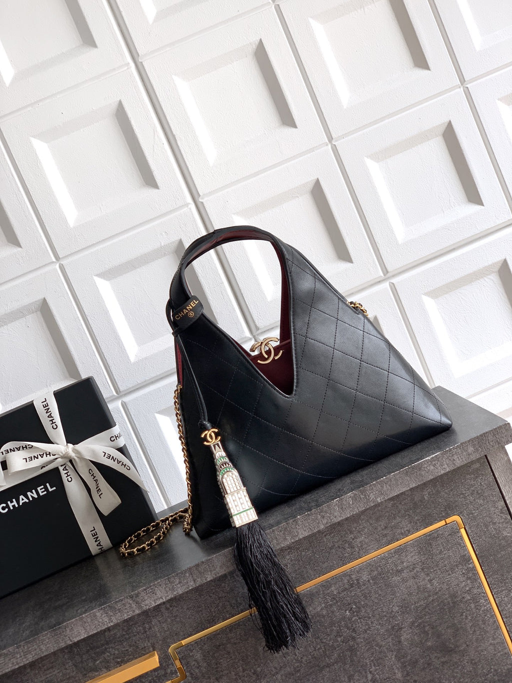 Quilted Leather Triangle Top Handle Bag