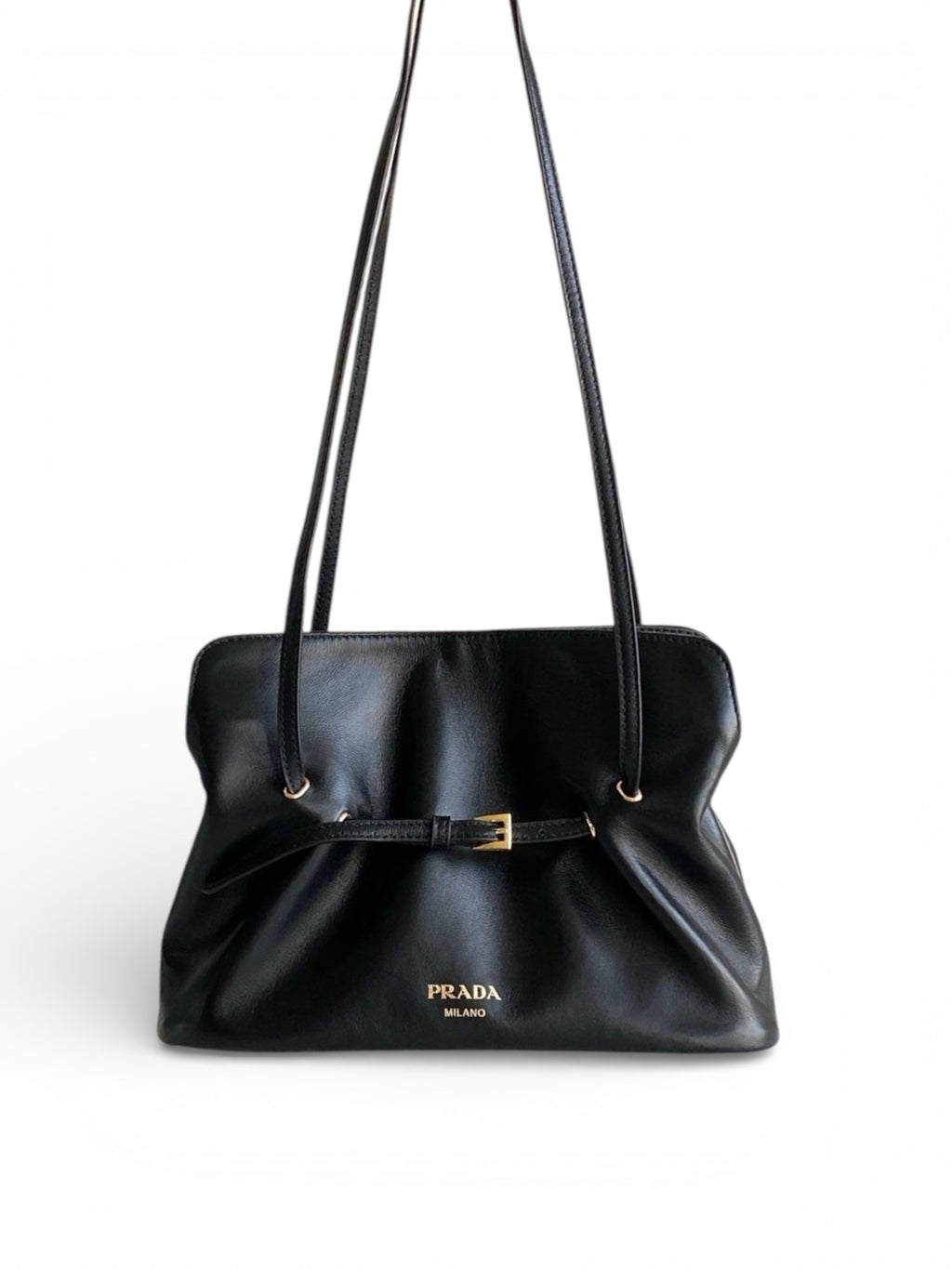 Black Prada handbag on a white background