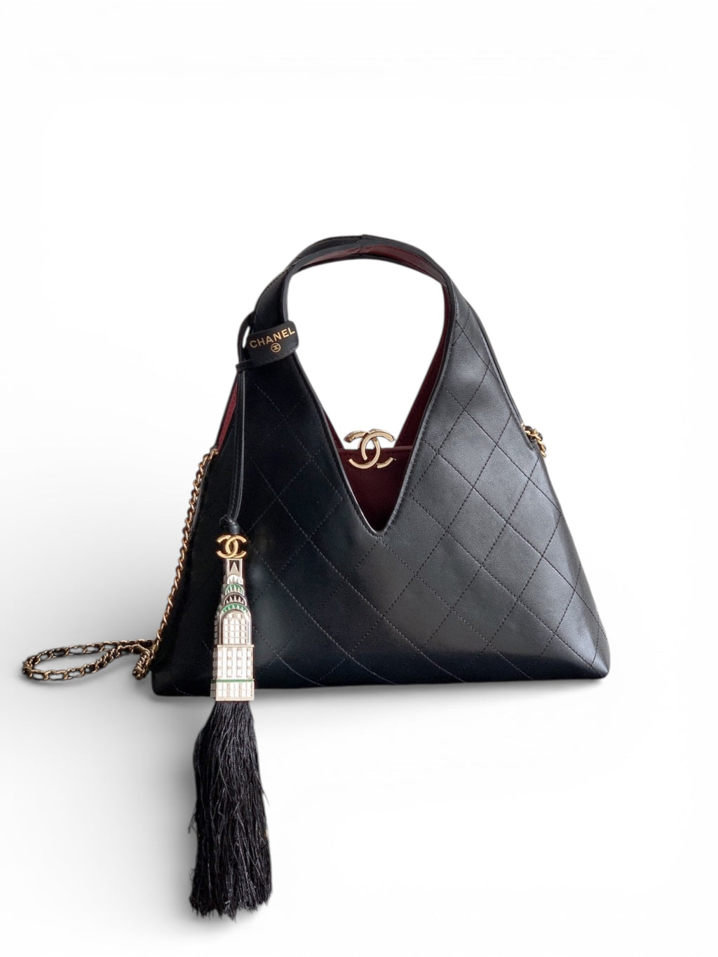 Quilted Leather Triangle Top Handle Bag
