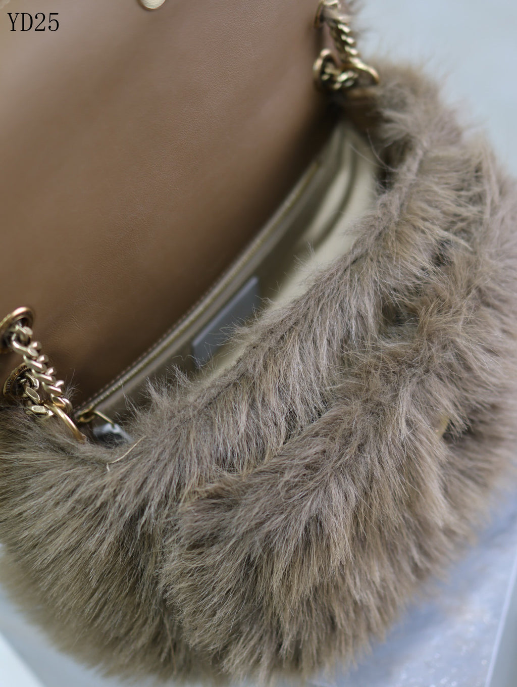 Niki Small in Shearling Bag