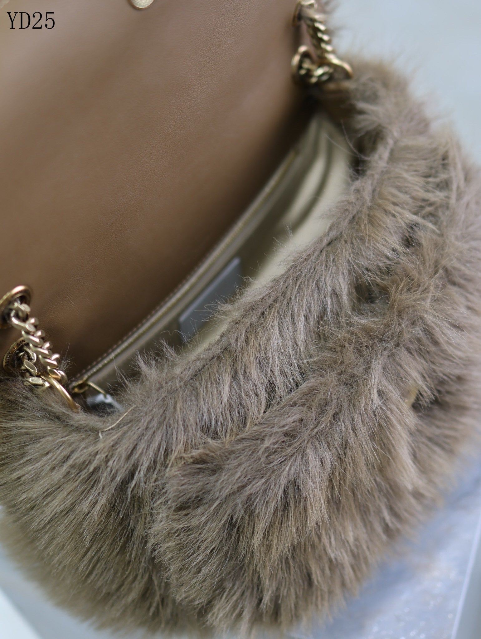 Niki Small in Shearling Bag