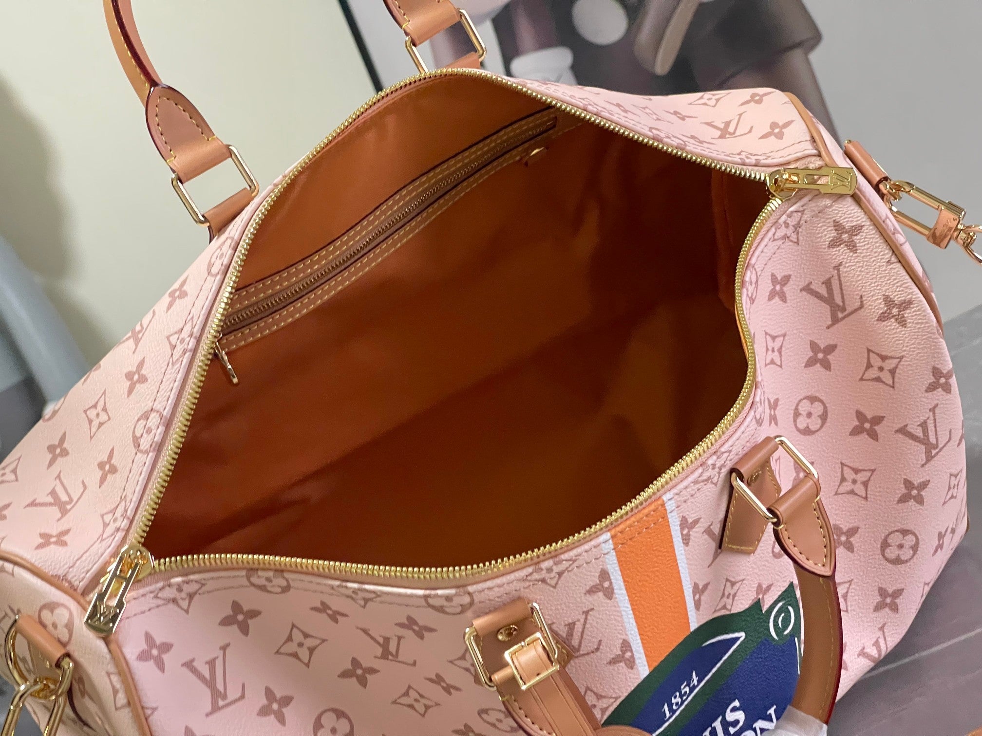 Keepall Bandoulière 50 – Pink Monogram Canvas with Vintage Logo Patch