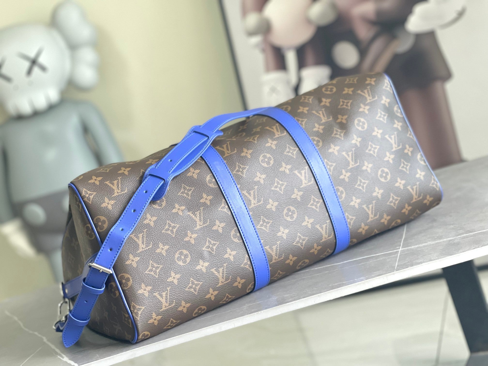 Keepall Bandoulière 50 – Monogram Canvas with Blue Leather Trim