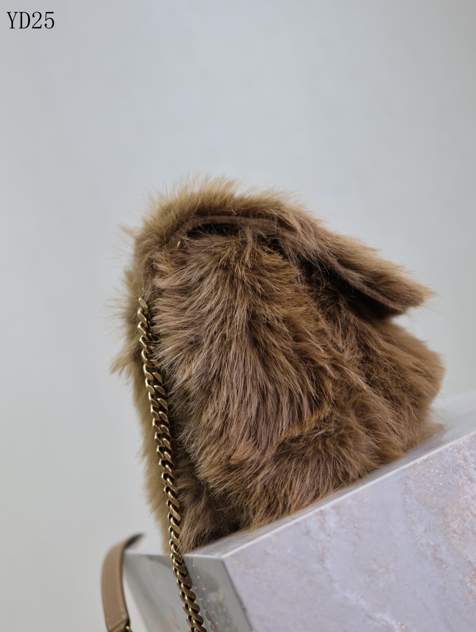 Niki Small in Shearling Bag