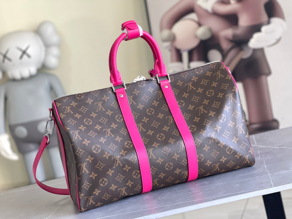 Keepall Bandoulière 50 – Monogram Canvas with Pink Leather Trim