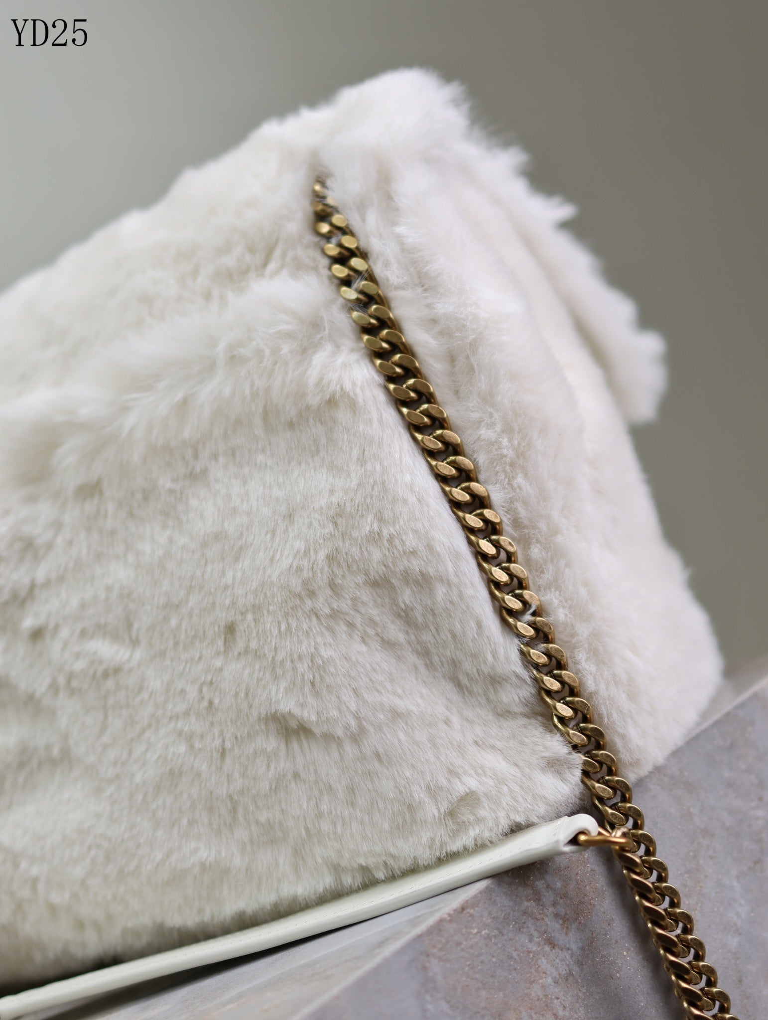 Niki Small in Shearling Bag